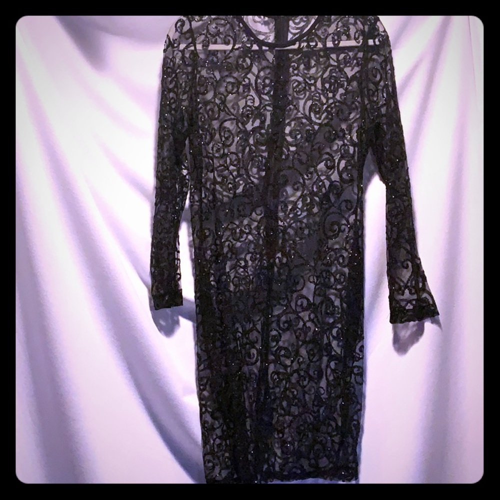 Sheer custom made dress.